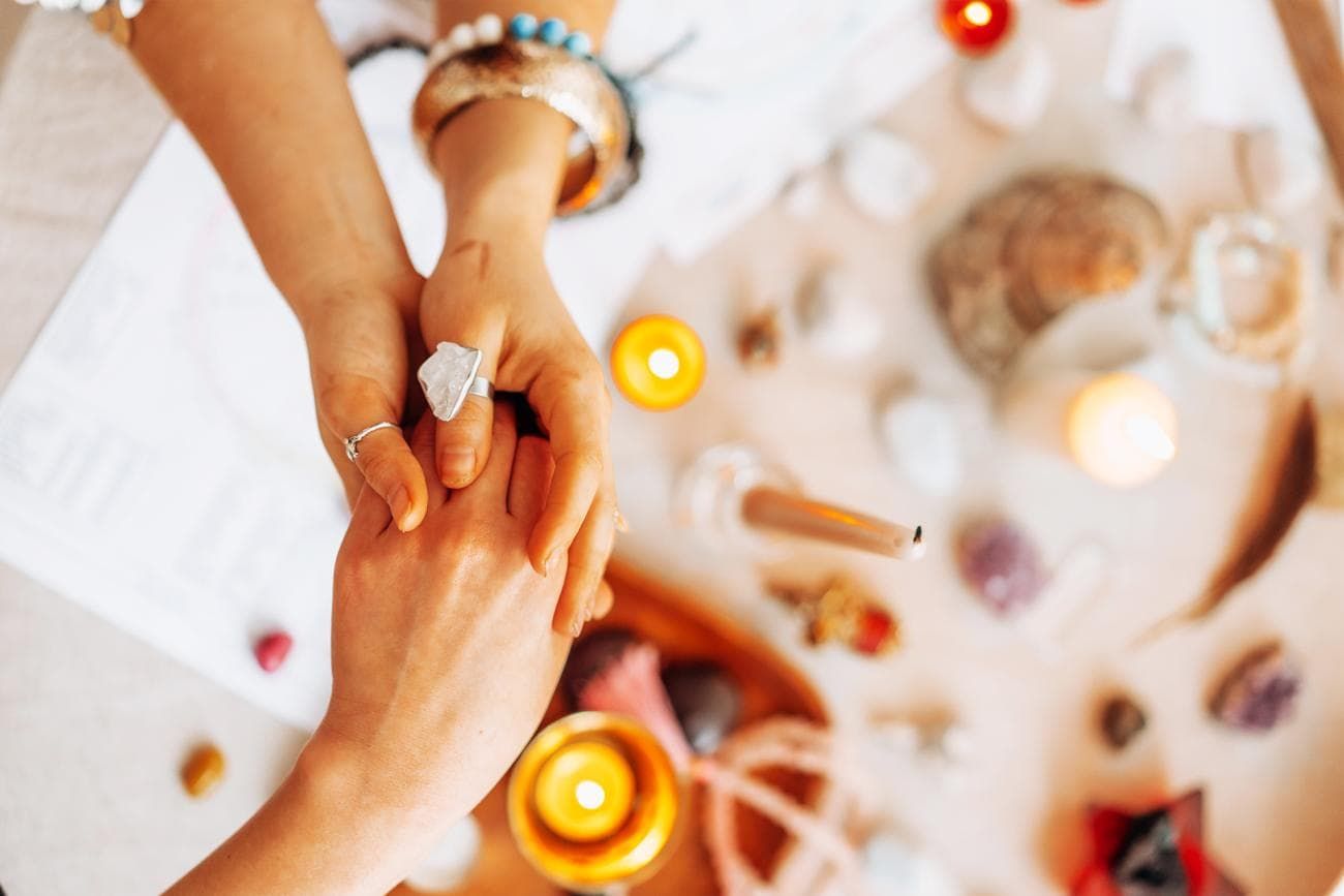 Woman receiving Reiki treatment