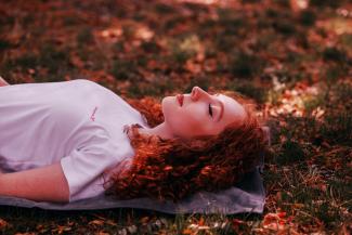 Red haired woman relaxing